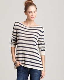 Enjoy easy weekend dressing in this striped Vince sweater with a wide neck and scoop back for a unique--and chic--look all season long. Layer the semi-sheer style over a basic tank and team with your favorite jeans for the perfect brunch-ready pairing.