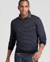 Knit entirely from soft merino wool, this clever design features thin stripes all over and solid elbow patches for unique flair.