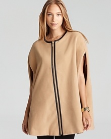 Go strikingly oversize in a sumptuous Calvin Klein cape, embellished with faux-leather trim for contemporary edge.