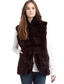 THE LOOKStand-up collarFront hook and eye closureSleevelessFront slash pocketsTHE FITAbout 26 from shoulder to hemTHE MATERIALDyed rex rabbit furFully linedCARE & ORIGINDry clean by fur specialistImportedFur origin: China