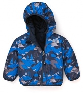 A reversible hooded coat by The North Face® converts to cool blue camougflage.