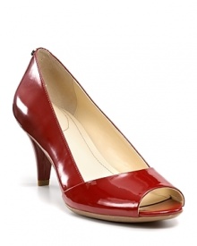 Patent leather gleams over a sculptural vamp on these peeptoes. A triangular heel adds to the artistic effect.