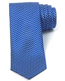 A simple pattern of small geometric shapes creates a textural appearance on this luxurious Italian silk tie from HUGO.