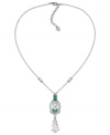 Center of attraction. Carolee's necklace is crafted from silver-tone mixed metal with a stone pendant in green shining through. Approximate length: 18 inches. Approximate drop: 2-3/8 inches.