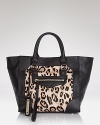 At the office or on-the-go, Sam Edelman's leopard print porter tote is a must in the season's hottest structured shape.