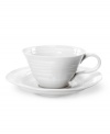 A collaboration between Portmeirion and celebrated chef Sophie Conran, this versatile teacup and saucer set from their collection of white dinnerware offers the charming look of hand-thrown pottery in porcelain designed for the rigors of daily use.