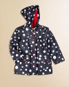 The perfect rainy weather companion for your little one, with ultra-soft terry lining for extra comfort. Attached hoodLong sleevesSnap frontFront flap snap pocketsFully linedPolyurethaneLining: 78% cotton/22% polyesterMachine washImported