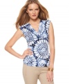 A bold floral print adds pop to this MICHAEL Michael Kors top -- perfect for a bright spring look!