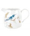 Abuzz with hummingbirds, the airy and bright Nectar creamer brings the outdoors in. Versatile bone china formed in Spode's impressions shapes with a crisp white glaze complements serene country settings.