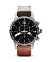 A textured, checked strap lends a hit of distinctive style to this watch from Burberry. Crafted of stainless steel with a bold three-eye chronograph, it's a killer touch.