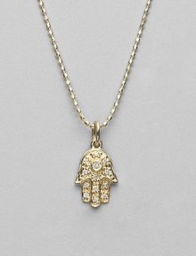 The open hand, a traditional symbol of protection, set with pavé diamonds and a diamond center on a 14k yellow gold ball chain. Diamonds, 0.05 tcw 14k yellow gold Chain length, about 16 Pendant, about ½L x ¼W Lobster clasp Imported