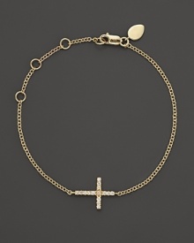 A diamond-studded cross adds elegance to this slender, adjustable 14K. yellow gold bracelet from Meira T.