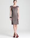 A smoky grey hue revitalizes the classic BOSS Black sheath dress for a sleek, sophisticated approach to the 9-to-5. Team with color-pop heels and elevate the streamlined style to new heights of office chic.