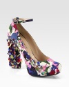 A blooming floral print amplifies this satin platform design, with a paillette embellished heel for stylish dimension. Paillette-covered heel, 5 (125mm)Hidden platform, 1 (25mm)Compares to a 4 heel (100mm)Crepe-back satin upperRemovable adjustable ankle strapLeather lining and solePadded insoleMade in Italy