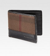 The ultimate accessory for any well-dressed man of style, crafted in signature check printed cotton and logo embossed leather.One billfold compartmentSix card slotsLeather/cotton4W x 4HImported