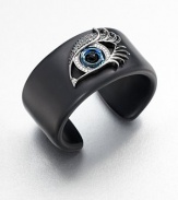 From the Envy Collection. The eyes have it in this striking cuff of jet black resin, dramatically adorned with a sweeping silver-outlined eye that gazes and glitters intently, set with cubic zirconia and black onyx.Black onyxBlack, white and blue cubic zirconiaSterling silverResinDiameter, about 2.25Imported