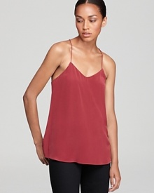 A brilliant Tibi silk cami is effortless on its own now, or layered under a blazer this fall. Team it with black pencil pants for work and a bright striped skirt come weekends.