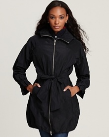 This Moncler anorak boasts a shapely silhouette with a bubble hem and cinched waist.