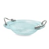 The Lotus Pond Collection takes its inspiration from the mystical and serene symbolism associated with aquatic imagery. The transparent and shimmering nature of glass perfectly expresses the quality of the surface of water. The solid metal handles rise out from the glass surface just as lotus flowers pierce water, reaching up and bending backwards. Made of nickelplate and glass.Small bowl measures 15.25 x 13.5.