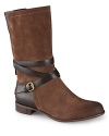 UGG® Australia takes stylish, buckled wraparound ankle straps and sets them off against a burnished backdrop.