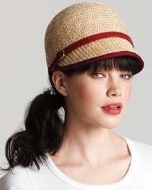 An equestrian style straw cap with pretty red leather trim and buckle detail at side.