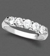 A pristine 14k white gold ring with a stunning arrangement of five brilliant round-cut diamonds (3/4 ct. t.w.).