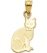 Display your loving bond with your feline with this carved cat charm in 14k gold. Reverses to read I (Heart) My Cat in bold text. Chain not included. Approximate drop length: 4/5 inch. Approximate drop width: 2/5 inch.