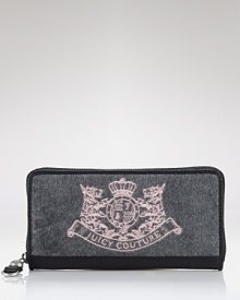 Soft velour, trimmed with leather, gets the royal treatment with a Juicy Couture crest.