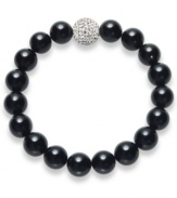 A traditional style with bold, modern appeal. This smooth strand bracelet showcases shiny onyx beads (10 mm) and a sparkling crystal ball at center (12 mm). Bracelet stretches to fit wrist. Approximate length: 7 inches.