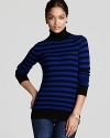 Bundle up with effortless chic in this C by Bloomingdale's striped sweater rendered in plush cashmere.