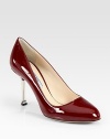 Classic single sole pumps with a chrome heel. Chrome heel, 3 (75mm)Patent leather upperLeather lining and solePadded insoleMade in ItalyOUR FIT MODEL RECOMMENDS ordering one half size up as this style runs small. 