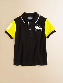 It's game time in this athletic jersey-inspired cotton mesh polo, featuring Ralph Lauren's iconic pony at the chest and twill 3 embellishments.Ribbed polo collarShort sleevesButton-frontEven-vented hemCottonMachine washImported Please note: Number of buttons may vary depending on size ordered. 