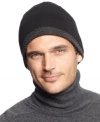 Minimalist design with maximum versatility: A barely there herringbone is the only pattern in a wear-with-everything skullcap from Calvin Klein that reverse to solid black with charcoal tipping.