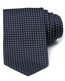 This Armani Collezioni tie strengthens your professional look with a reserved pattern and classic width.