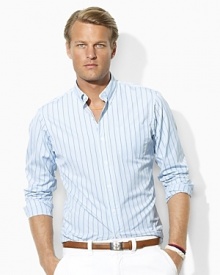 A trim-fitting shirt is crafted from silky cotton poplin in an end-on-end weave with sleek stripes for refined polish.