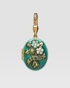 Emerald-colored CRYSTALLIZED - Swarovski Elements sparkle on this handcrafted, hand-enameled birthstone locket that opens to hold a favorite photo. Crystal Enamel 18k goldplated brass & brass-plated pewter Month indicated on the back Length, about 1¼ Width, about 1 Spring clip clasp Made in USA