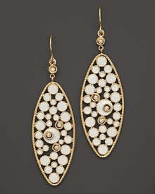 Diamonds set in enamel and 14K yellow gold.