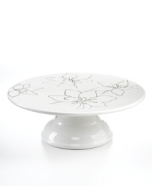 Hand painted and etched in dishwasher-safe earthenware, the Anna cake stand showcases everything from peach pie to chocolate cake with the always-fresh florals of Laurie Gates serveware.