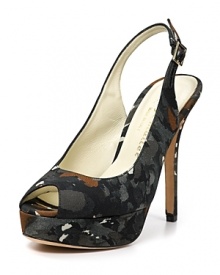 Turn heads in these striking slingbacks, covered in a camouflage print. There's no way you can hide in these. By Bettye Muller.