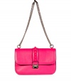 Glamorize every look with Valentinos bright pink leather shoulder bag, detailed with tonal oversized rockstuds and a chain-link strap for that impossibly ladylike feel - Push-stud closure, removable chain shoulder strap, inside zippered back wall pocket - Carry as a pretty polish to cocktail dresses or tailored separates