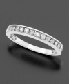 Round-cut channel-set diamonds (1/5 ct. t.w.) are the epitome of classic luxury. Diamond ring set in 14k white gold.