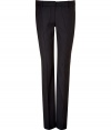 Stylish pant in fine, pure wool - Classically elegant in navy with subtle pin stripe - Modern silhouette is long and slim - Pleat detail at front and back extends from hip to hem, lengthening and flattering the leg - Tab closure and belt loops - Welt pockets at rear - A sleek, sophisticated go-to for day and evening - Pair with a silk or sequin blouse, a blazer and platform pumps