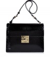 Give dressy day to evening looks an exquisitely luxurious polish with Salvatore Ferragamos jet black python shoulder bag - Flap with hinged logo lock closure, key attached to strap, gold-toned logo hardware, black leather interior, zippered back wall sectional pocket - An elegant accessory destined to be a multi-season gem