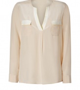 With an effortless chic look in pristine silk, Steffen Schrauts pastel detailed top is perfect for both dressing up and down - Open round neckline, long sleeves, buttoned cuffs, side slits, flap chest pockets, two-tone trim - Loosely fitted - Wear with skinnies, flats and a leather carryall