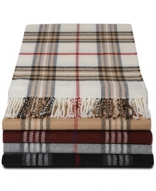 You can't go wrong adding a plaid accent. Especially when it's John Ashford's ultra-soft, generously sized rendition of the traditional tartan muffler in shades keyed to the colors of the season.