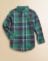 A plaid button-down shirt embroidered with Ralph Lauren's signature pony provides a timeless, handsome look.Pointed button-down collarLong sleeves with single-button barrel cuffsButton-frontShirttail hemCottonMachine washImported Please note: Number of buttons may vary depending on size ordered. 