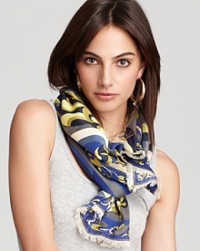 With a beautiful abstract flower print in blues and greens, this Emilio Pucci scarf looks flawless with a denim shirt or pair of skinnies.