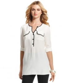 Contrasting piped trim makes this petite Alfani blouse stand apart--easily pairs with dark skinny jeans or a pencil skirt.