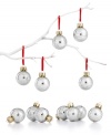 In gleaming silver glass with swirls of glitter, these Martha Stewart Collection mini ornaments make your tree look totally polished. (Clearance)