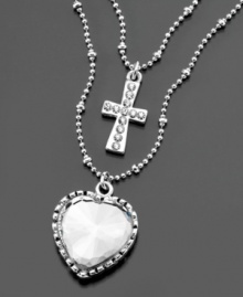 Finer fashion by Betsey Johnson. This double-strand, silvertone mixed metal necklace features sparkling heart and cross pendants. Approximate outer chain length: 18 inches. Approximate inner chain length: 14 inches, plus 2-1/2 inch extender. Approximate drop: 1-1/2 inches.